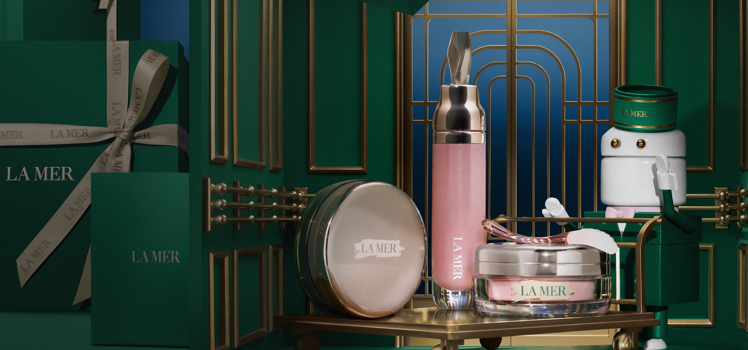 Selection of La Mer lip products on a gold sleigh