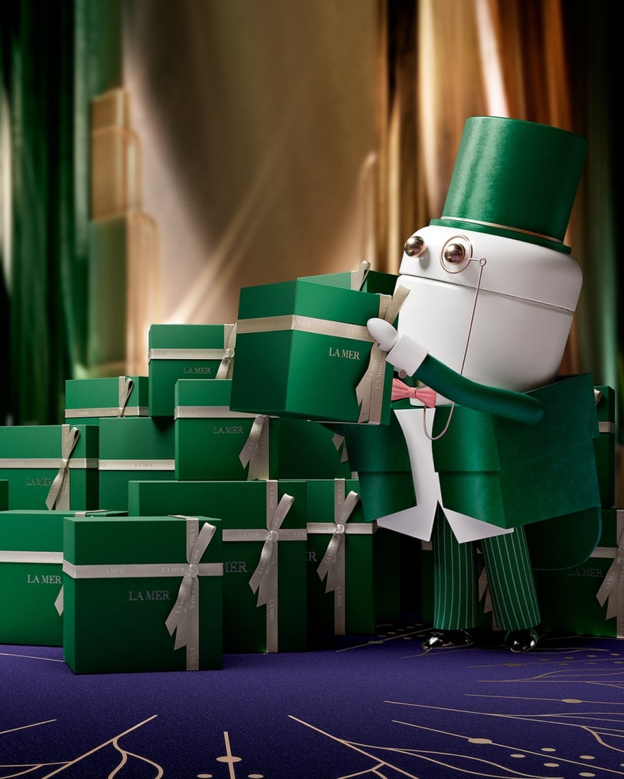 La Mer attendant caricature stacking La mer signature green gift boxes
